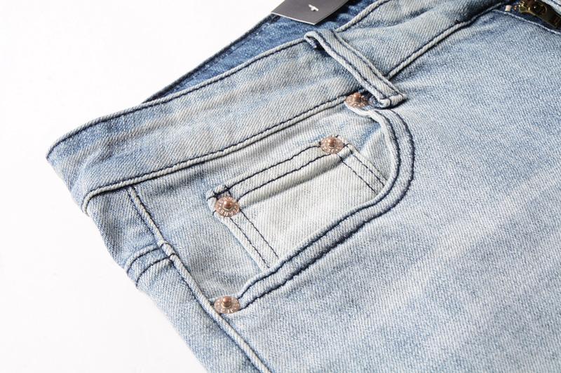 Ripped jeans, light blue color, slim fit 
