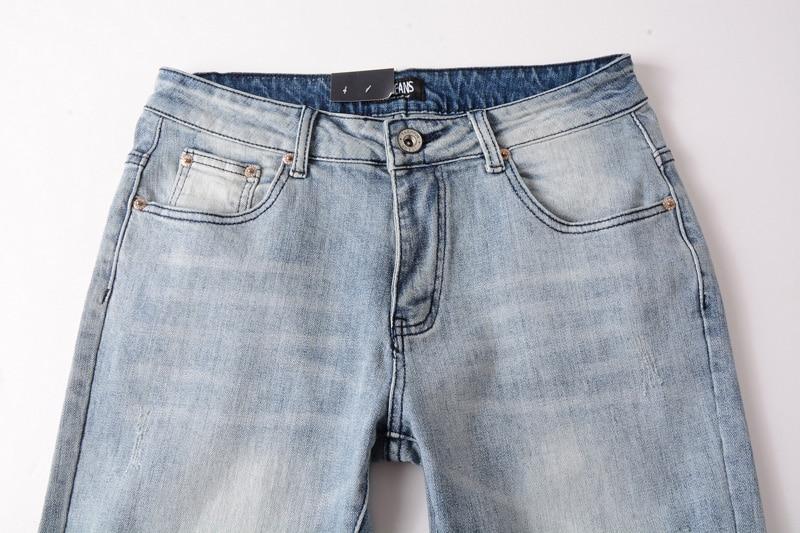Ripped jeans, light blue color, slim fit 